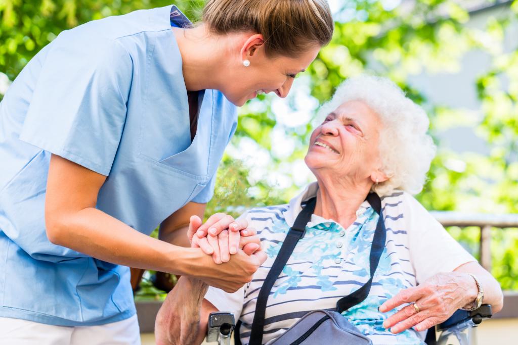 Caregiver with elderly female