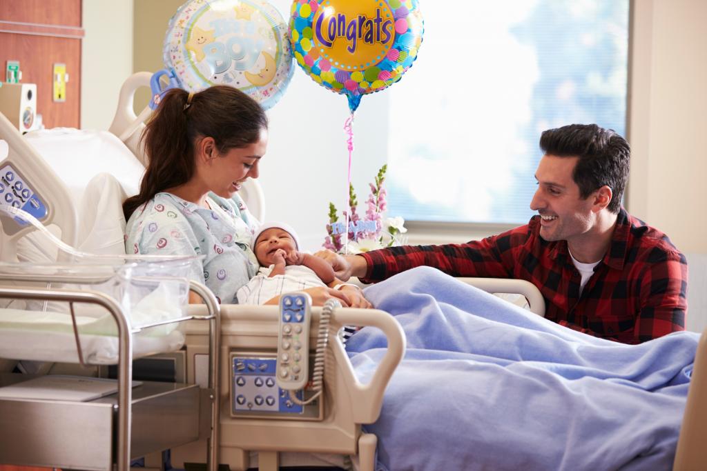 Parents of newborn in hospital room