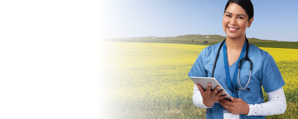 Image of a healthcare worker standing in front of a field with a blue overlay