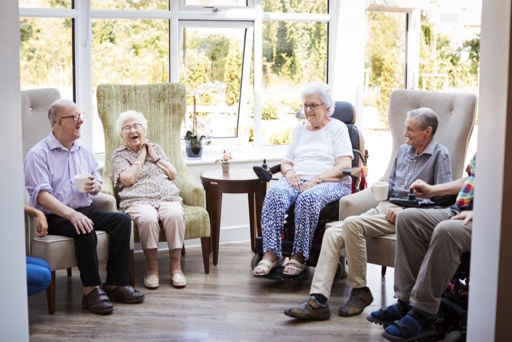 Group of elderly people sitting in a group