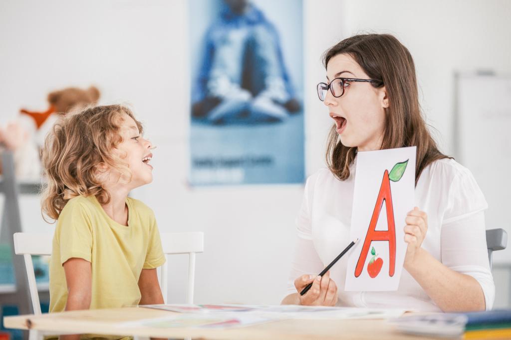 Teacher with preschool student