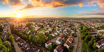 sun rising over small town