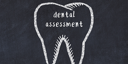 picture of tooth with dental assessment written inside