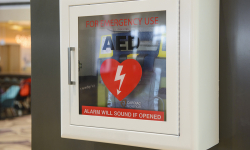 Automated External Defibrillator (AED) mounted on a wall
