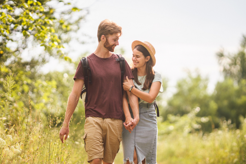Young happy couple walking