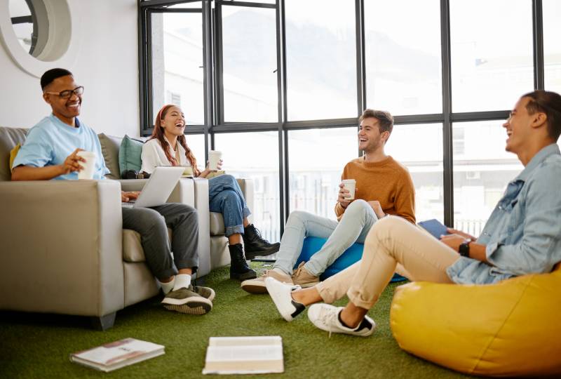group of people sitting on bean bags