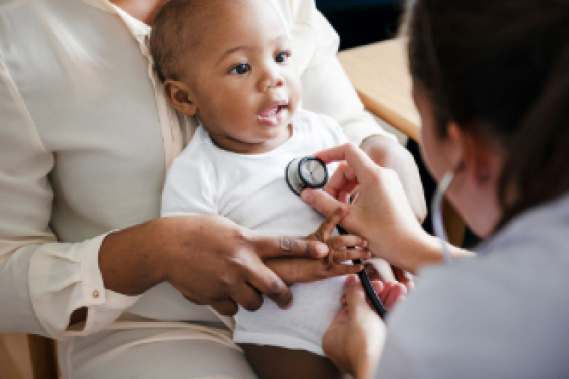 baby at doctor's office with stethoscope