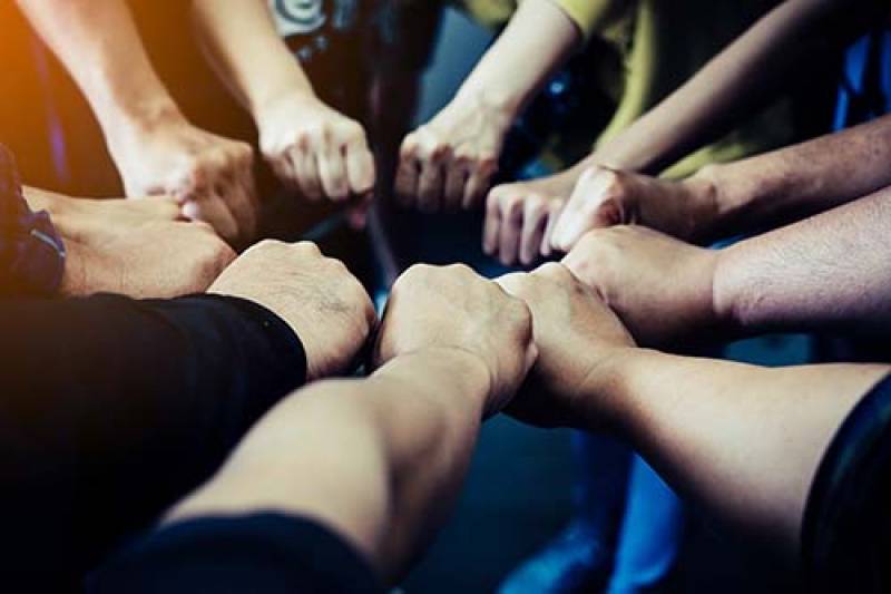 fists in circle