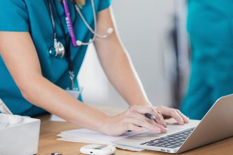 Nurse using computer