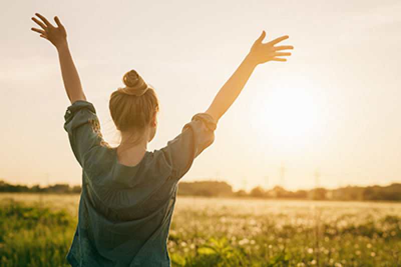 Woman holding hands in the air