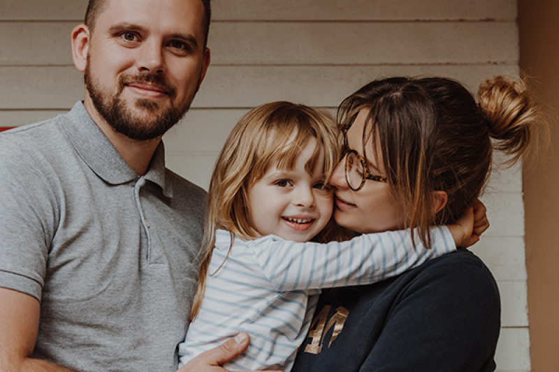 Picture of a mother, father and little girl